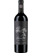 Rotwein von Bodegas Juan Gil, BLACK LABEL Limited Edition 2023, dunkle Trauben im Glas, elegantes Weindesign, edle Weinflasche.