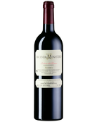 Hacienda Monasterio Reserva 2018 Rotwein von Bodegas Hacienda Monasterio im Glas, dunkle Rotweinfarbe, elegante Flasche.